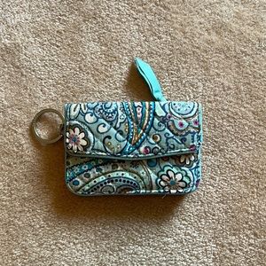 Vera Bradley zip ID wallet with extra snap compartment, perfect condition.